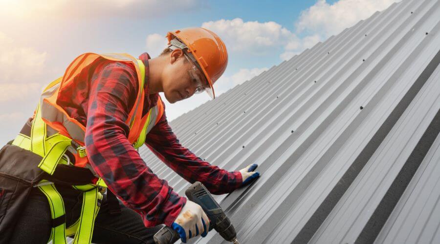 Professional gutter cleaning in Comins, MI